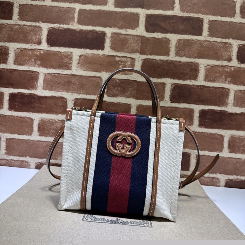 G*u*i shopping bags